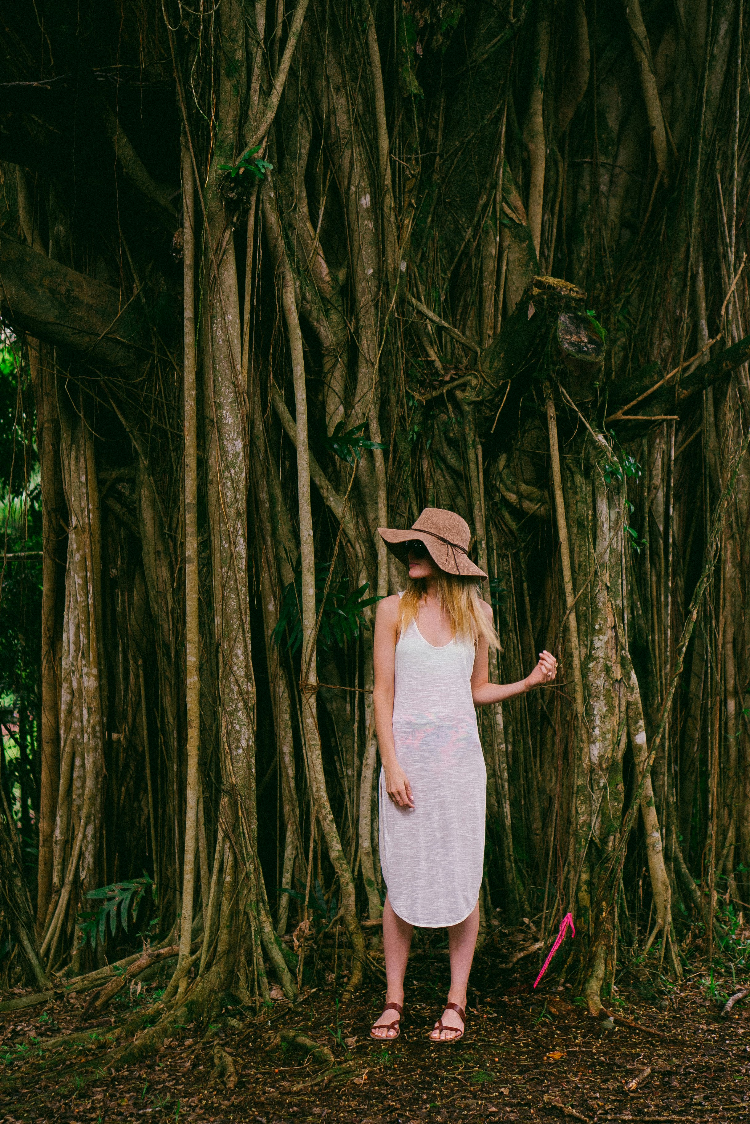 woman standing near tree